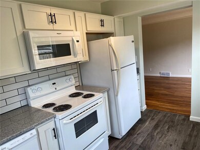 Kitchen looking out to the dining/living room area