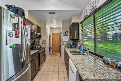 Access to the garage and laundry is on the right