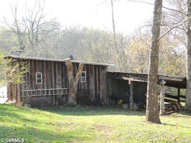 Storage - Side view of garage, workshop and lean t