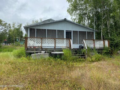 Covered porch and deck facing lake