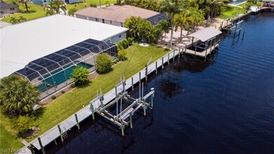 Aerial View of Rear of Home | Dock | Boat Lift