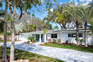 FRONT OF HOME WITH MARBLE CIRCULAR DRIVE