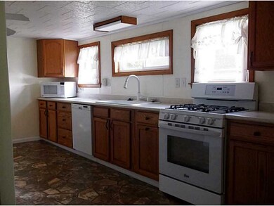 Exterior Front. large galley kitchen