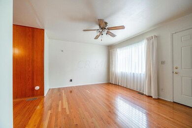 Living room with Hardwoods Great Light