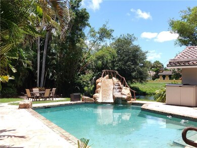 pool with waterfall & slide
