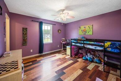 The 2nd bedroom provides finished wooden flooring, ceiling fan & ample space! 71 Rebecca Drive Manchester, TN 37355