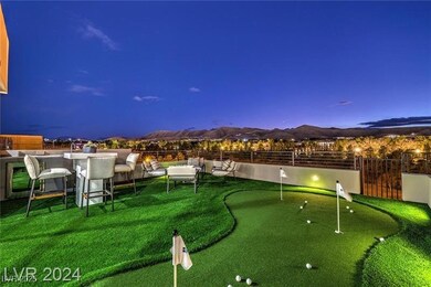 View of yard featuring fence, a mountain view, and
