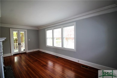 Living Room with French Doors to Side Porch!