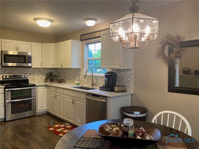 Kitchen flows into the Dining Room