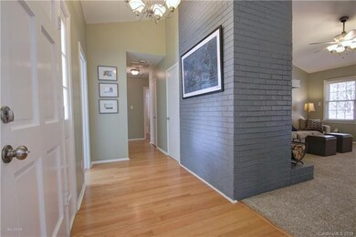 FOYER: The large inviting foyer offers glistening 