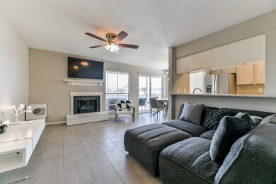 Spacious living room with a wood-burning fireplace