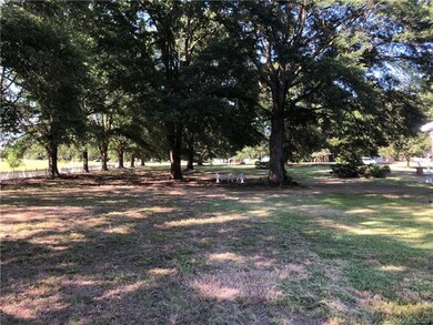Lovely large Oak trees on this acerage- home sits 
