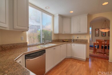 Updated kitchen includes granite counter tops and 