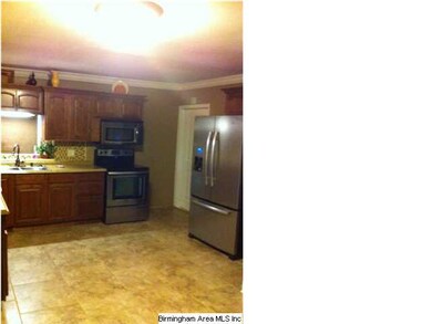Kitchen is huge. New cabinets, new tile floors, al
