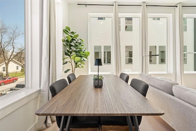 Dining room with visible vents and wood finished f