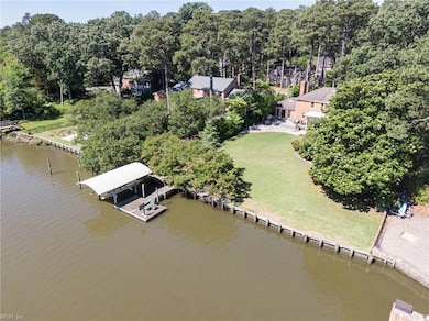 Bulkheaded water front, with a fully equipped 12K covered Boat lift