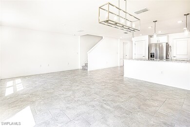 Unfurnished living room with stone finish flooring