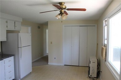 Kitchen with washer and dryer.