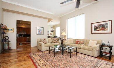 Another view of the living area looking towards the kitchen and dining room.