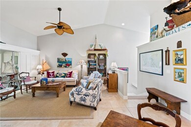 Living Area with High Ceilings and Tiled Floors