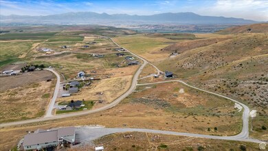Birds eye view of property featuring a mountain view and a rural view