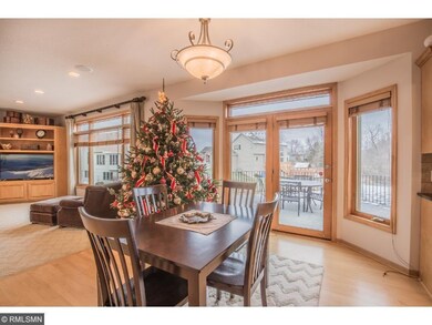 Sun-filled dinette, adjacent kitchen and living ro
