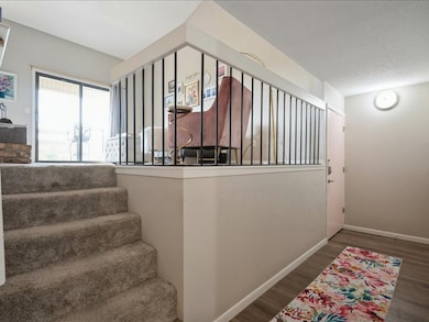 Entryway, looking up to living area.