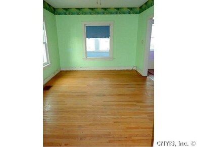 Living Room Unfurnished with HW floor exposed