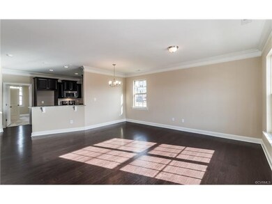Family room/dining area.  Hardwood floors.