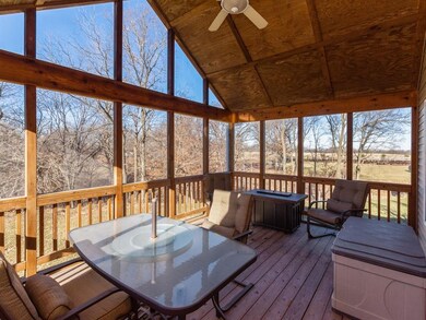 Catch the summer breezes on the screen porch