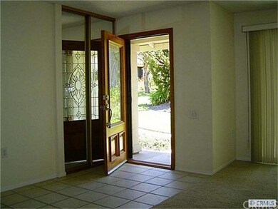 View looking out to front of house and greenbelt.