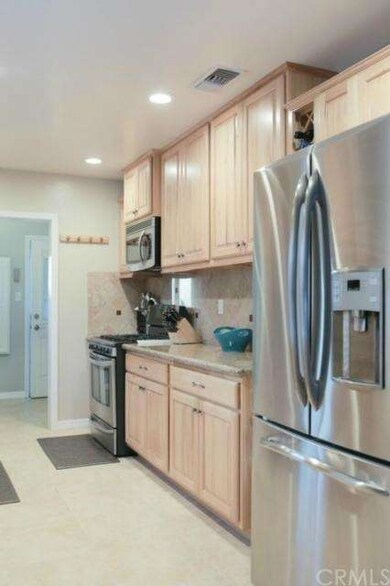 Hickory Wood Cabinets equipped with Stainless Stee