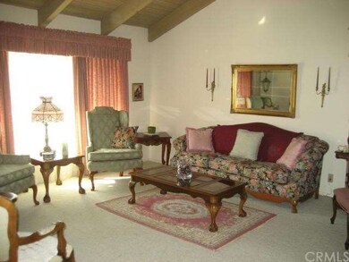 LIVING ROOM WITH LARGE FRONT WINDOW
