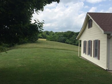 Hay Pasture Behind Garage