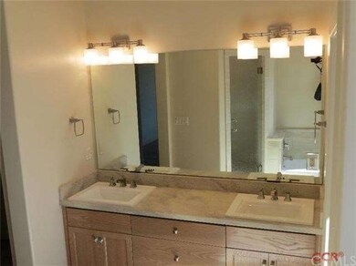 Master bath with dual sinks, bath tub and separate