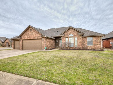 Ranch-style home featuring driveway, a garage, a s