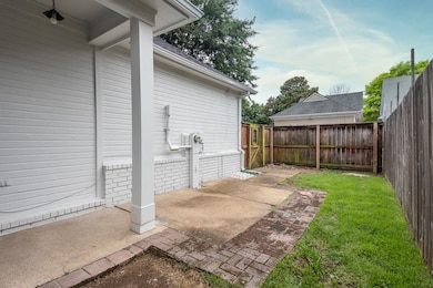 Fenced backyard featuring a patio area