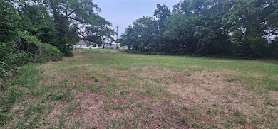Northwest corner looking east toward alley