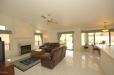 Kitchen overlooks Family Room