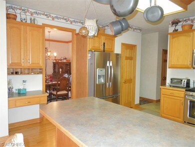 View of built in desk and additional cabinets.