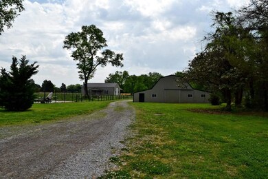 Drive Way Leading to a 6 stall Barn 