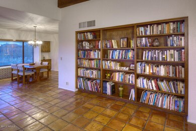 Living room book shelves towards dining