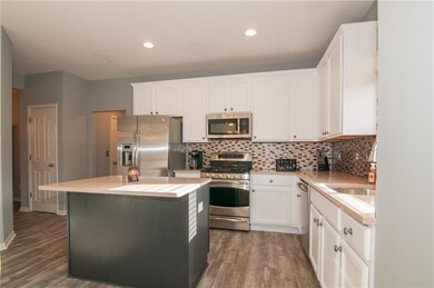 Undermount sink and backsplash