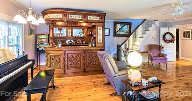 Intricately carved bar with stained glass inlays.