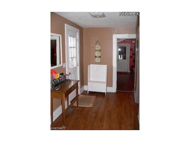 FOYER LOOKING INTO KITCHEN