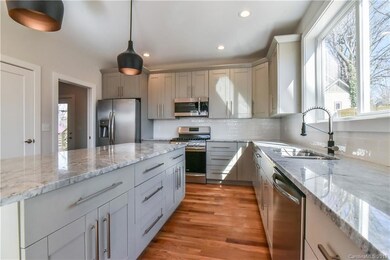 Large kitchen with plenty of work space and its the perfect space for entertaining.