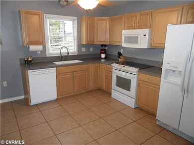 Kitchen - Corian, New Cabinets, Tile Floor