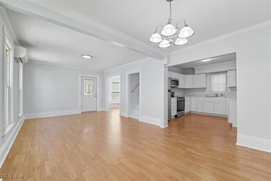 Dining room flows with living room open concept
