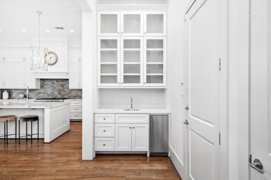 Wet bar conveniently located between kitchen and d