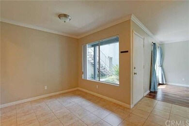 Tiled Floors & Crown Moulding Throughout
